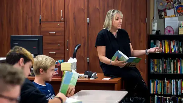 teacher reading from book