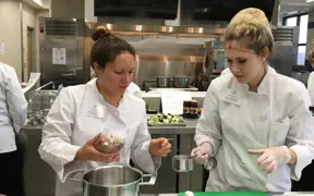 Students using kitchen to prepare food