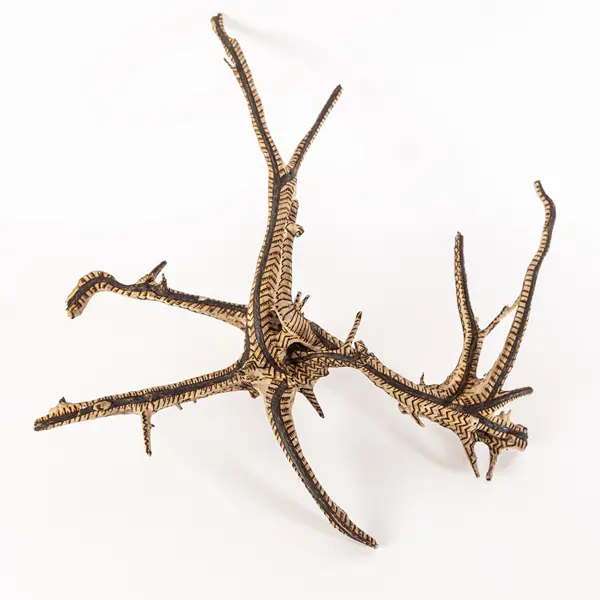 tattooed wood art piece