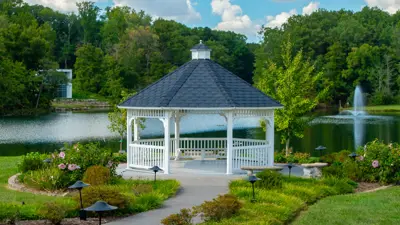 Gazebo at Reflection Lake with blue sky and puffy clouds