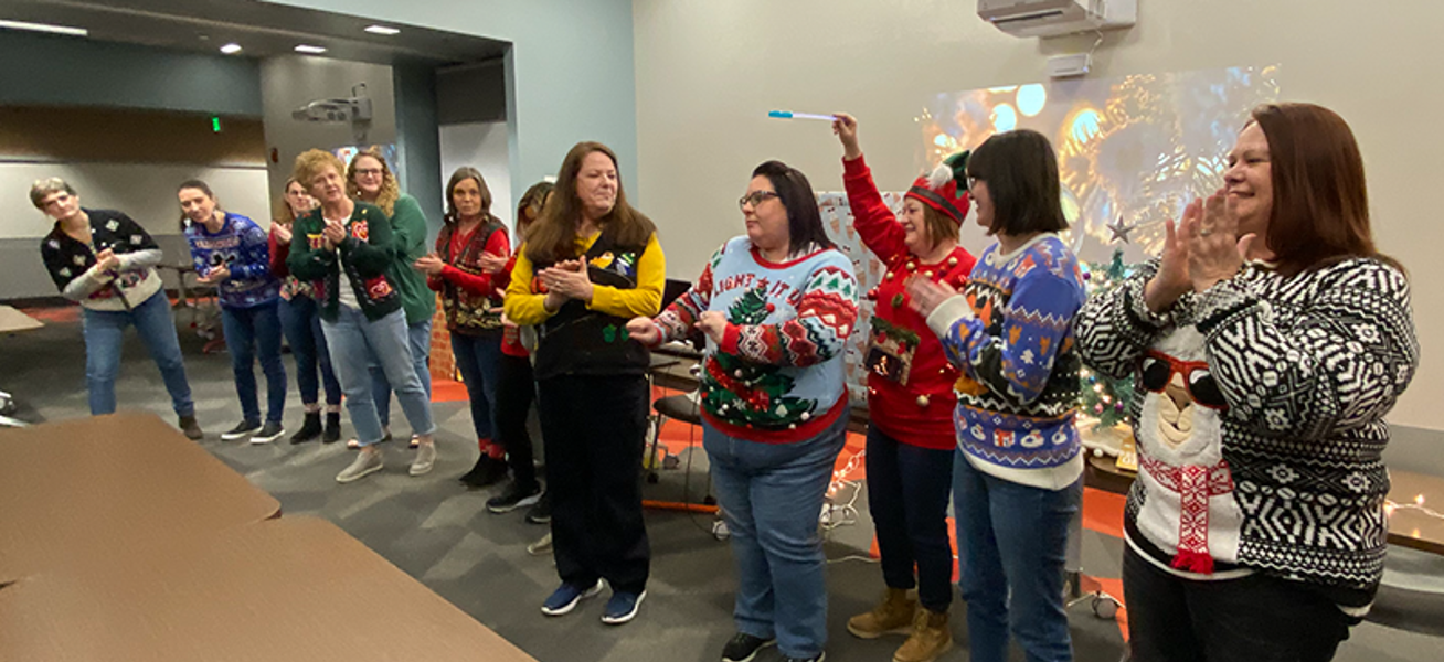 Ugly sweater contest participants