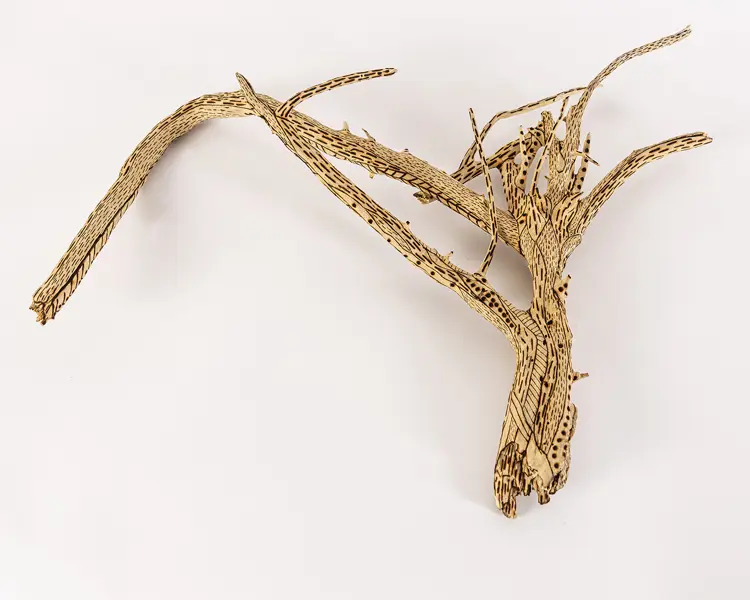 tattooed wood art piece