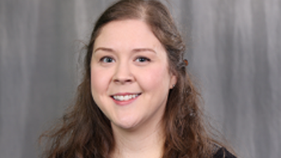 Casual portrait of USI criminal justice alumna Ashley Cox (King)