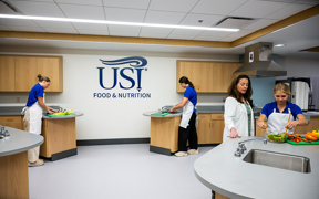 Students using kitchen in lower level of Health Professions Center