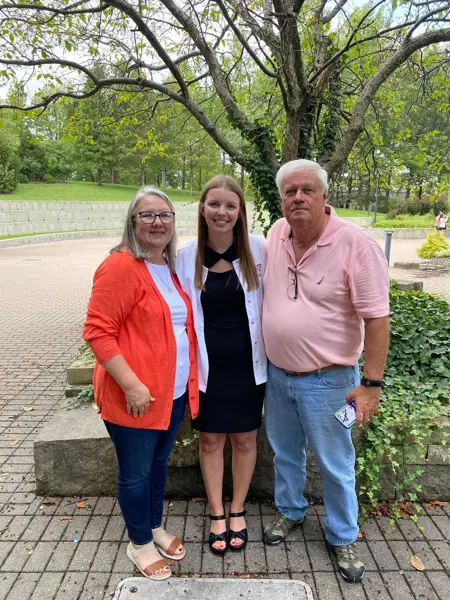 Photo of nursing student and her parents