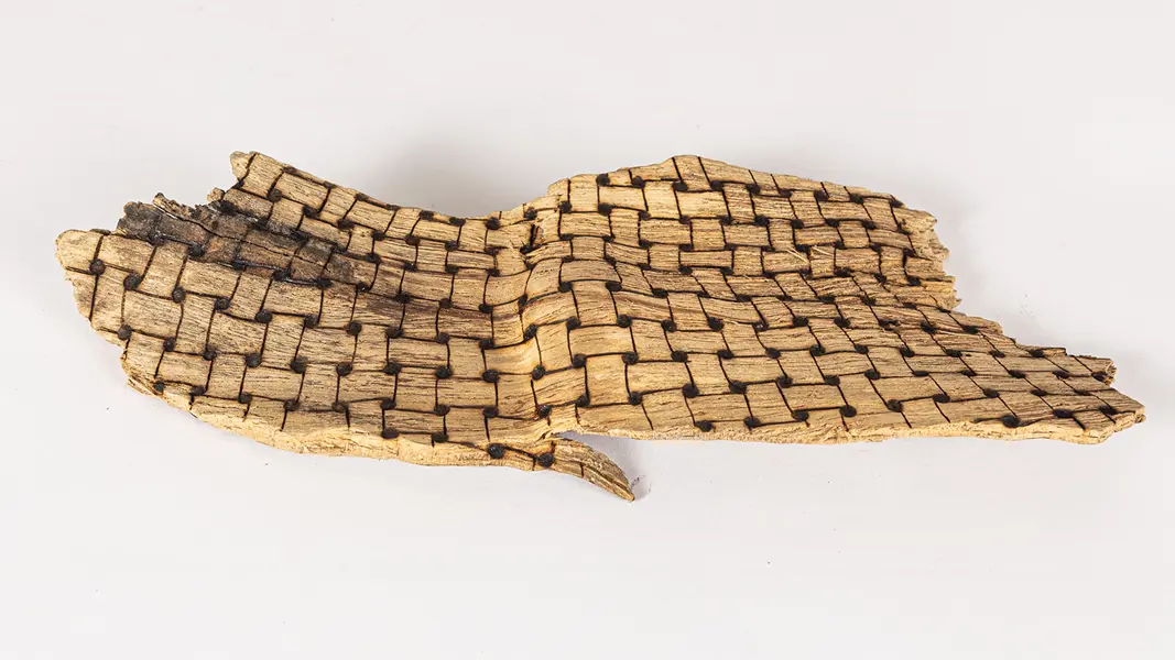 tattooed wood art piece
