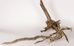 tattooed wood art piece