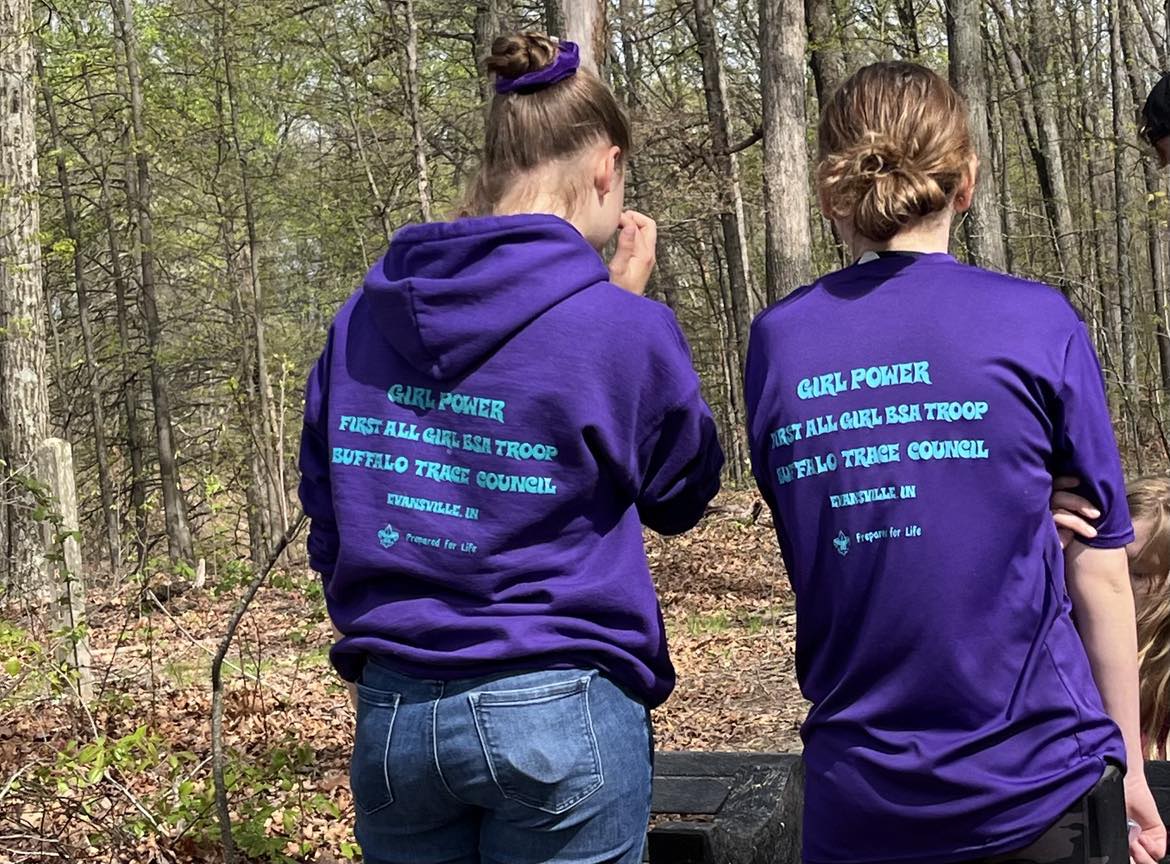 A Girl Scout Troop, also a Scouting Troop pause after installing a bench on the Bent Twig Trail