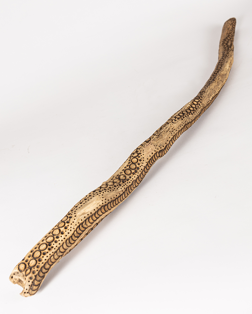 tattooed wood art piece