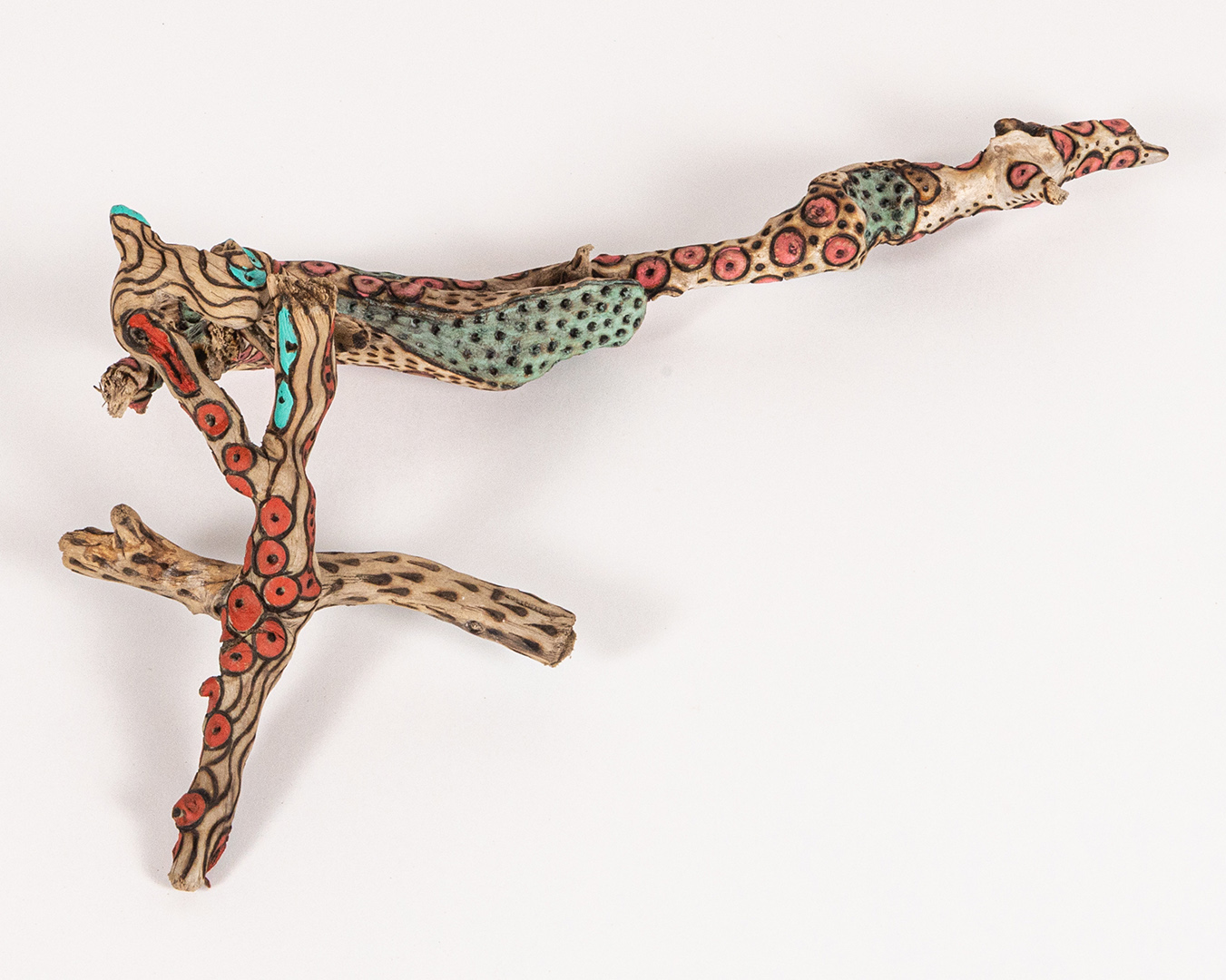 tattooed wood art piece