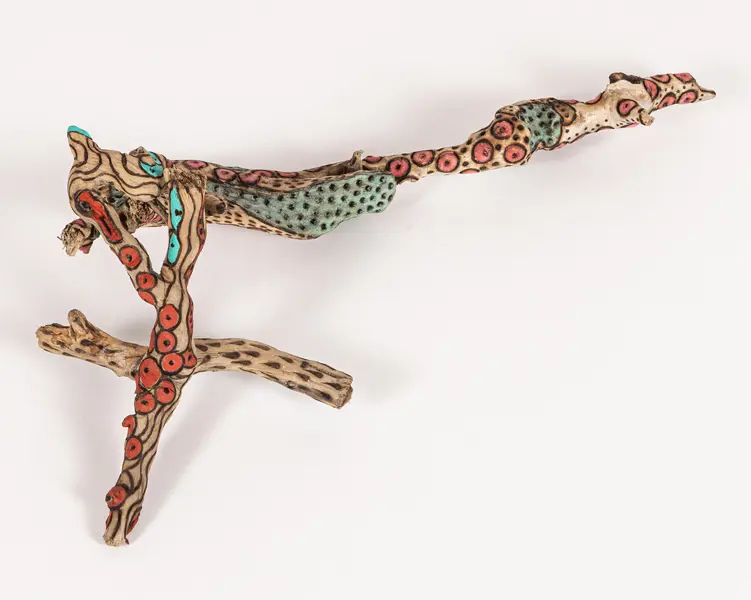 tattooed wood art piece