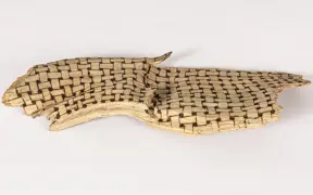 tattooed wood art piece