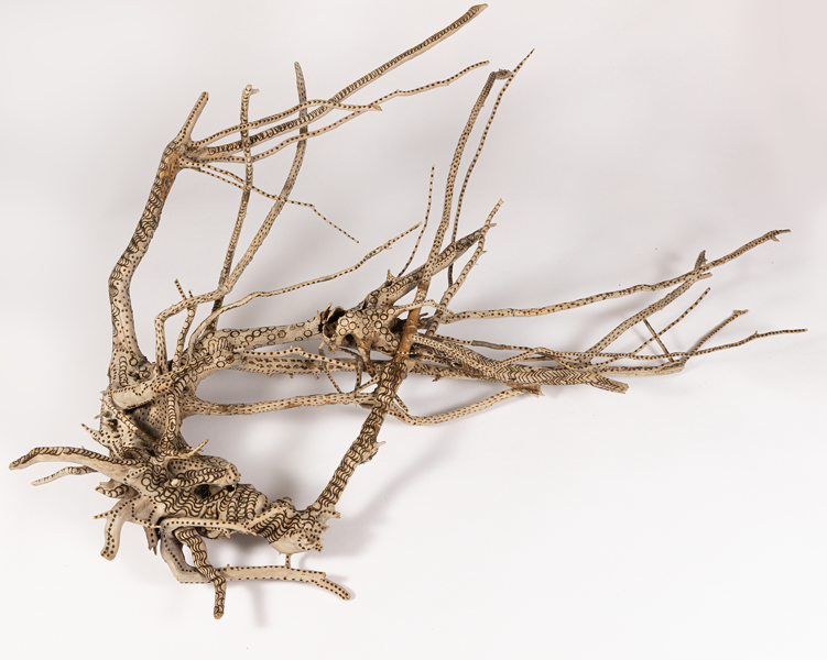 tattooed wood art piece