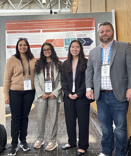 Maya Seshan and Alyson Collins pose with faculty instructors Dr. Srishti Srivastava and Josh McWilliams